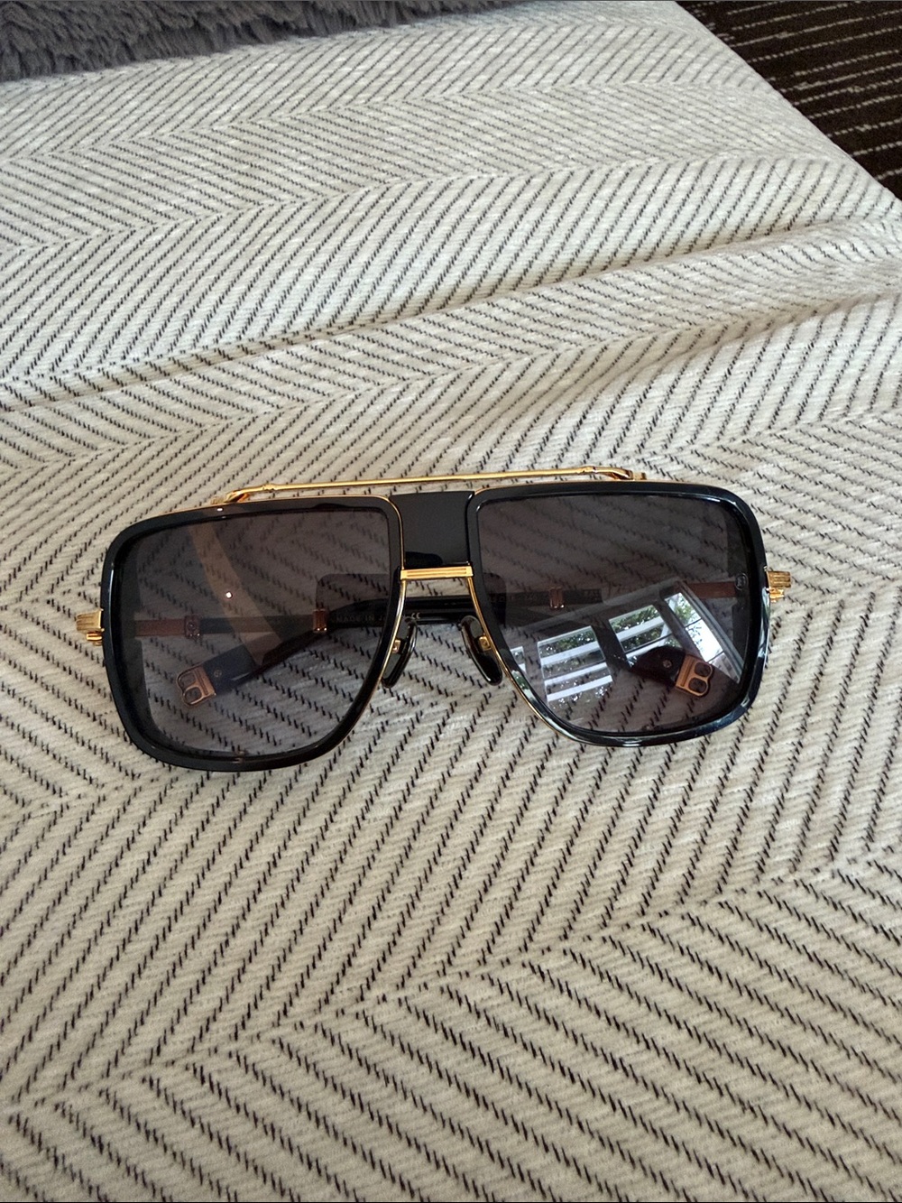 Balmain Black Shield Sunglasses with Gold Accents
